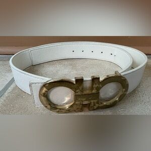 Salvatore Ferragamo white leather belt with gold buckle; length is 46”